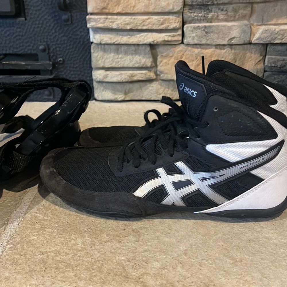 Wrestling shoes and Headgear barely used